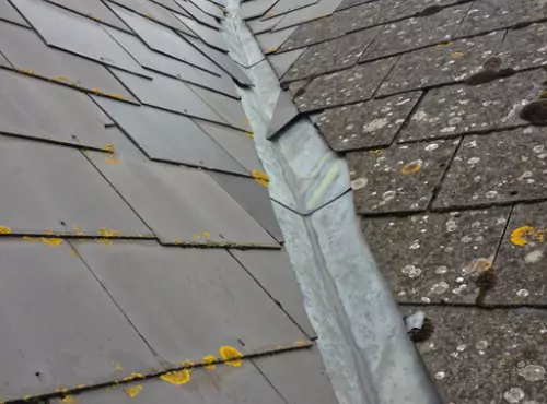 A roof with flashing is seen. For Flashing Repair in Bloomington IL, call Popejoy Roofing.