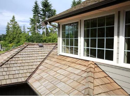 A house is seen with a tile roof. What type of roof do I need? Call Popejoy Roofing in Bloomington or Champaign IL.